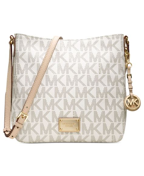 michael kors tan jet set crossbody authentic vs fake